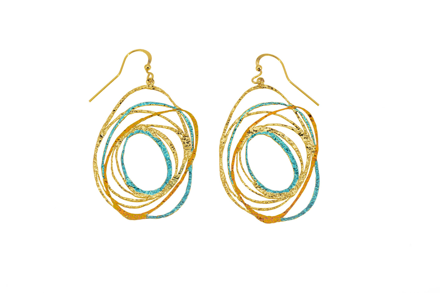 Oval brass drop earrings with layered abstract openwork design and turquoise and amber enamel accents, gold hook fastening on white background