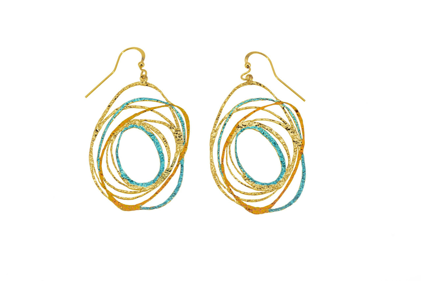 Oval brass drop earrings with layered abstract openwork design and turquoise and amber enamel accents, gold hook fastening on white background