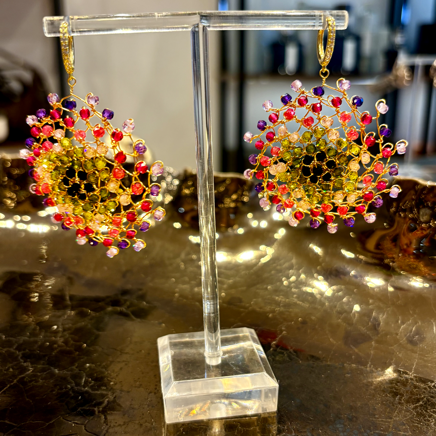 Peony Mandala earrings handcrafted with gold-plated copper wire and faceted crystals in pink, purple, green and fuchsia, with pavé-set gold hoop fasten