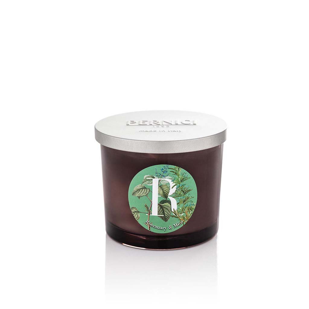 Cereria Pernici Elementi Rosemary & Mint 200g scented candle in a dark amber glass jar with silver Pernici lid and circular botanical herb label on a green background, product shot on white background