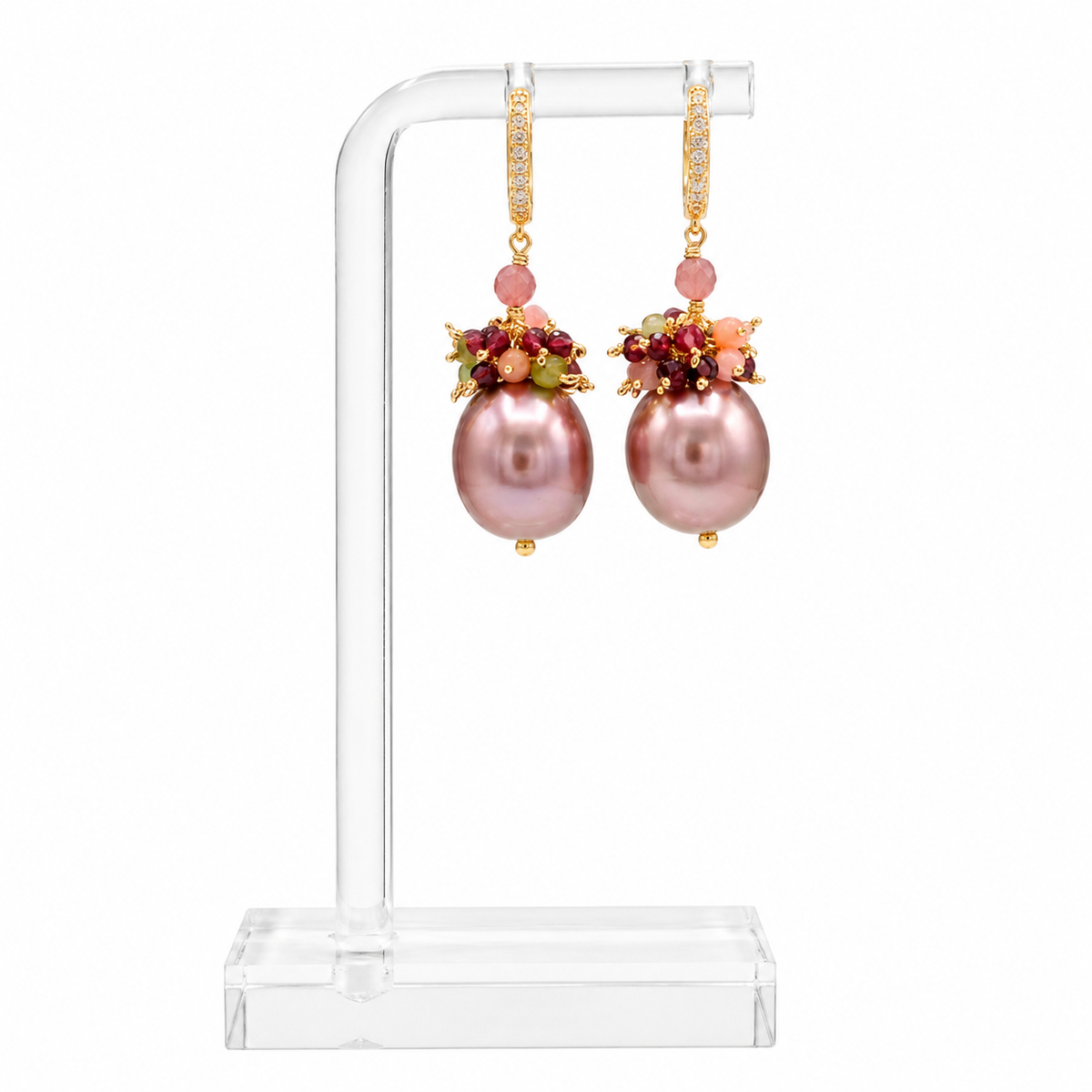 A generous pink Maiorca pearl, glowing with a soft rosé lustre, sits beneath a little posy of coloured tourmalines in raspberry, blush, peach and fresh spring green