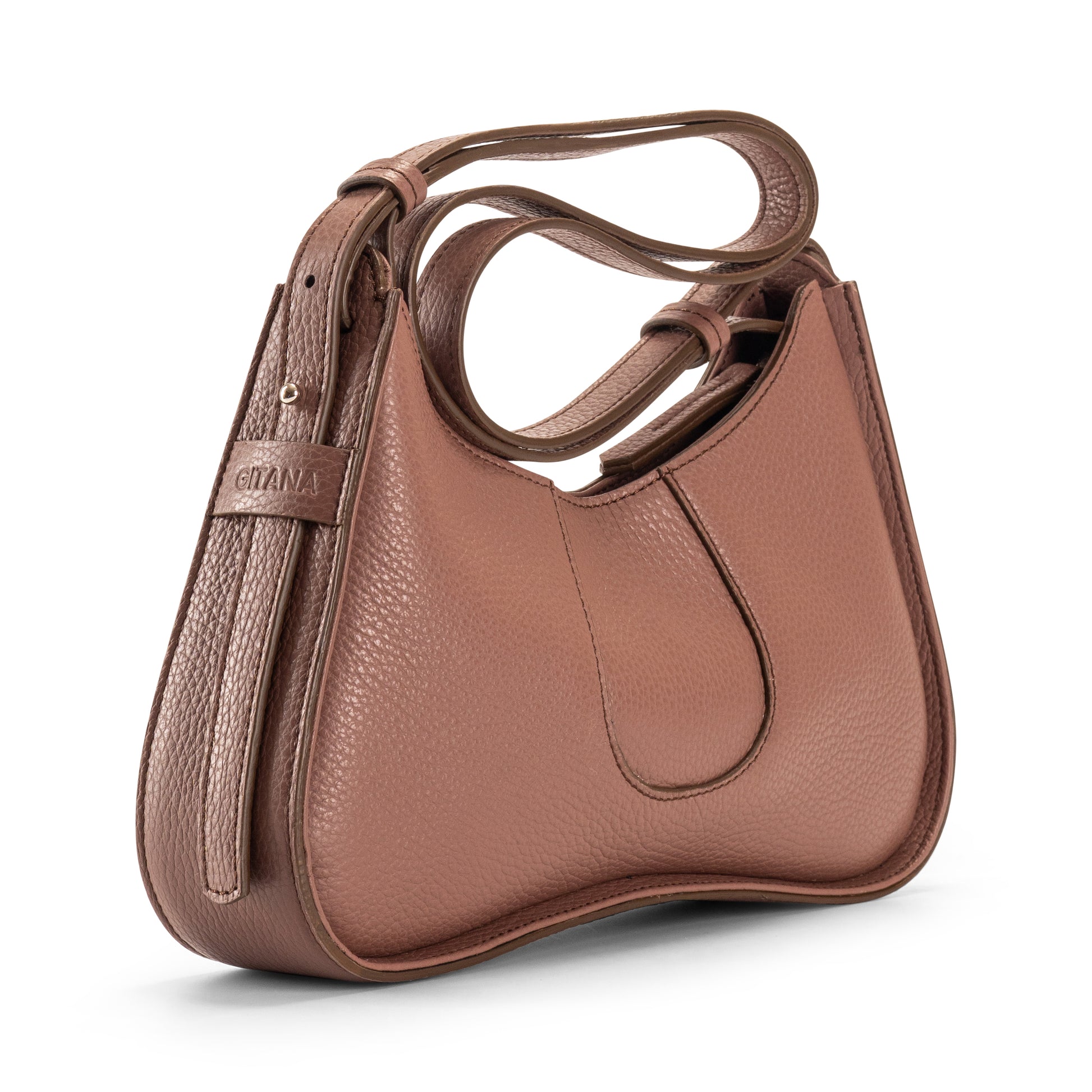 The Side View of a Toast Brown Italian Pebble Leather Handbag with Focus on the Gitana Brand Name.