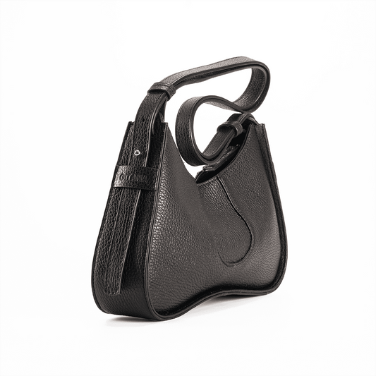 The Side View of Aria Shoulder Bag in Black Italian Pebble Calf Leather.