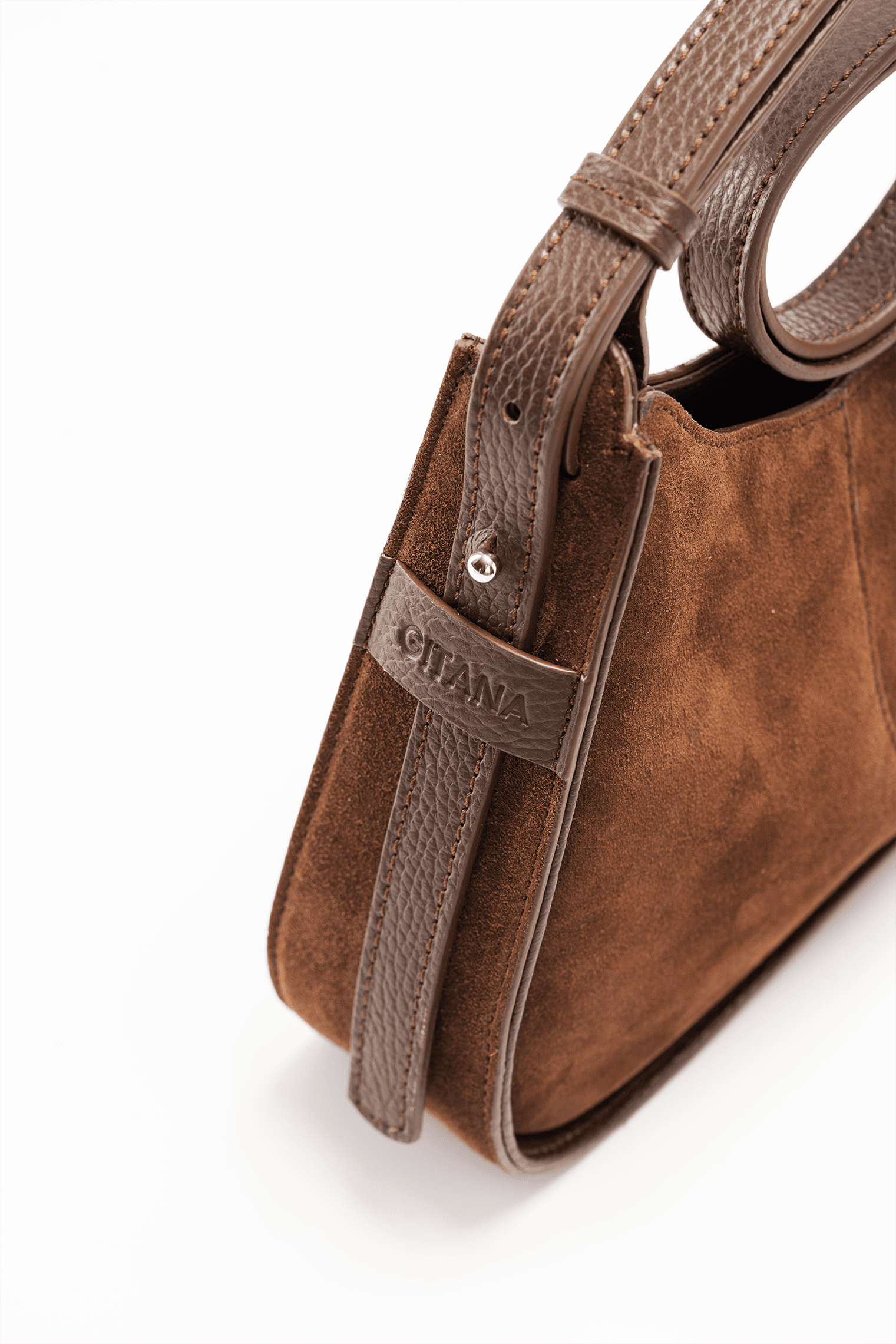 Brown Suede Leather Handbag with visible Gitana brand name on a white background