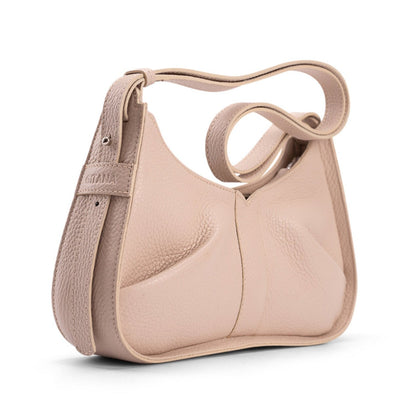 Close-up of the gusset of a luxury beige leather shoulder bag with the Gitana branding and a swirl adjustable shoulder strap.