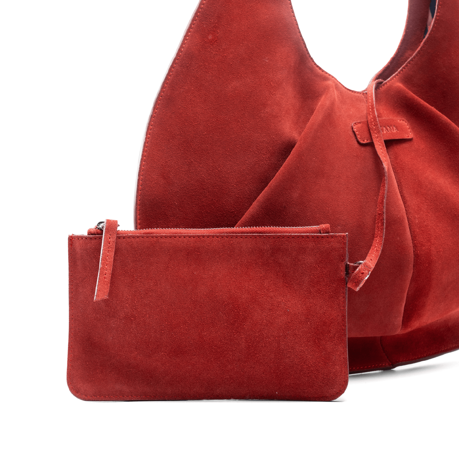 Red suede handbag and matching pouch on a white background.