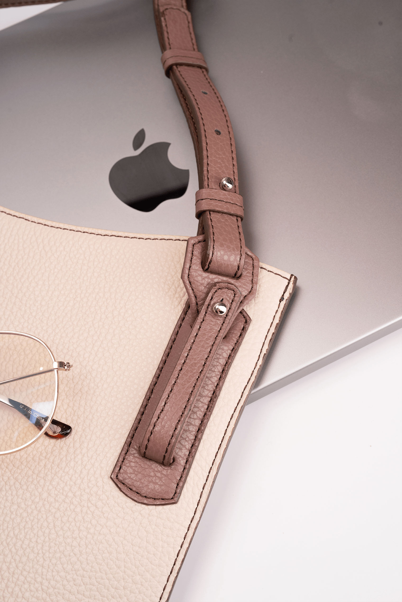 Simona Crossbody Bag Beige and chocolate trim pebble calf leather - Adjustable Strap Detail - Close-up View