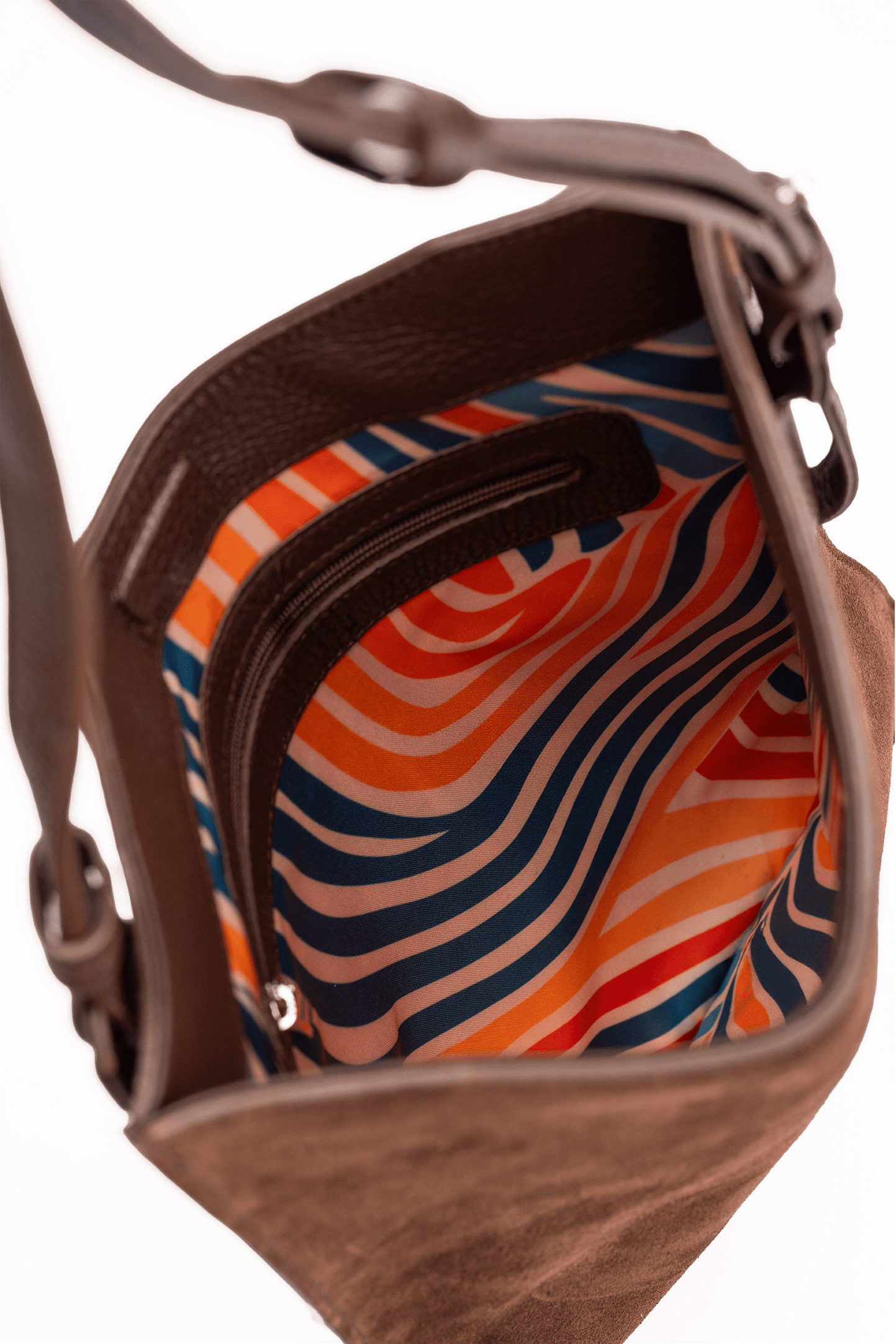 Simona Crossbody Brown Suede Leather Handbag - Interior Compartment View of Coloured Geometric Lining.