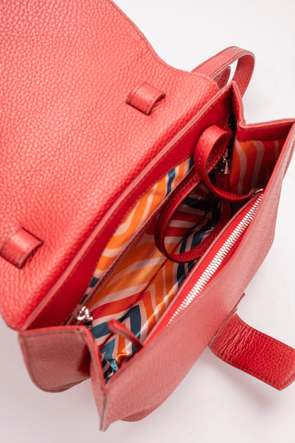 Yara Crossbody Bag in Red Italian Pebble Calf Leather - Interior Compartment Detail and colourful geometric lining.