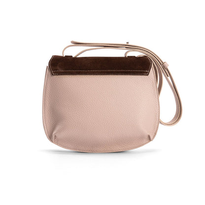 Back view of a medium-sized beige calf leather luxury women’s handbag with a beige and chocolate suede trim flap, designer leather bag.