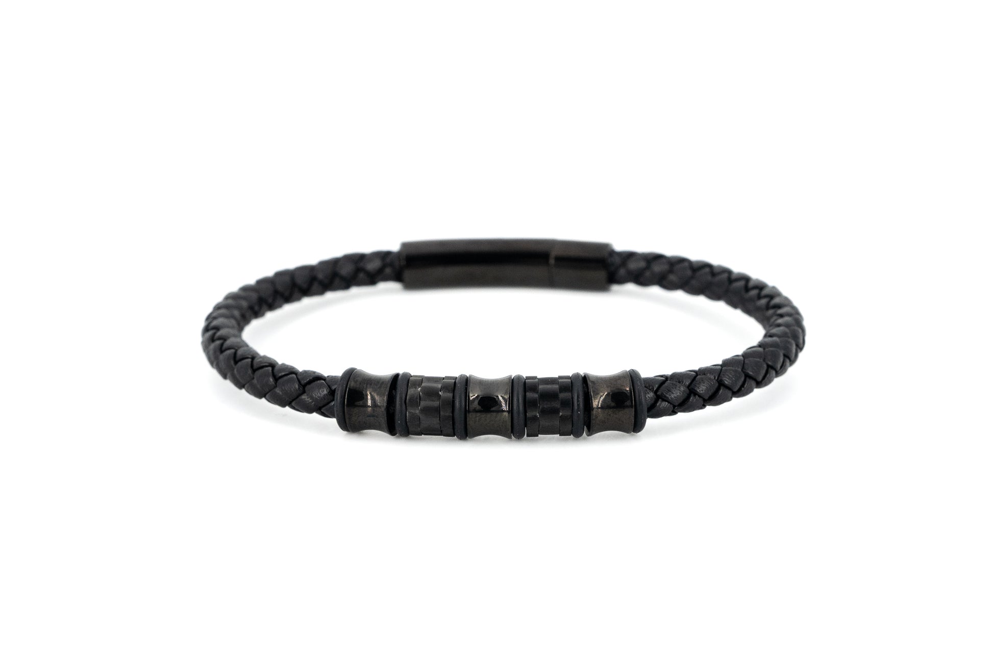 Black braided leather bracelet with twisted stainless steel centre detail and magnetic snap closure on white background