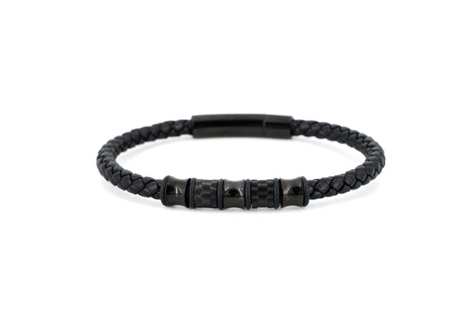 Black braided leather bracelet with twisted stainless steel centre detail and magnetic snap closure on white background