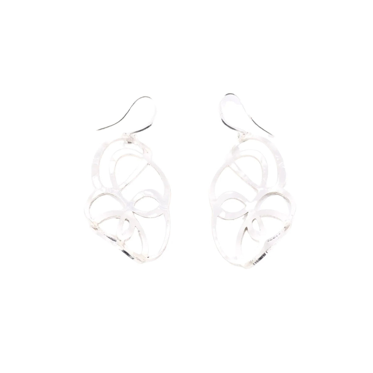 A pair of silver dangling earrings with an intricate openwork filigree design, shown against a plain white background.