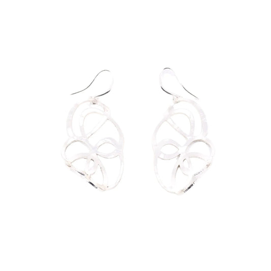 A pair of silver dangling earrings with an intricate openwork filigree design, shown against a plain white background.