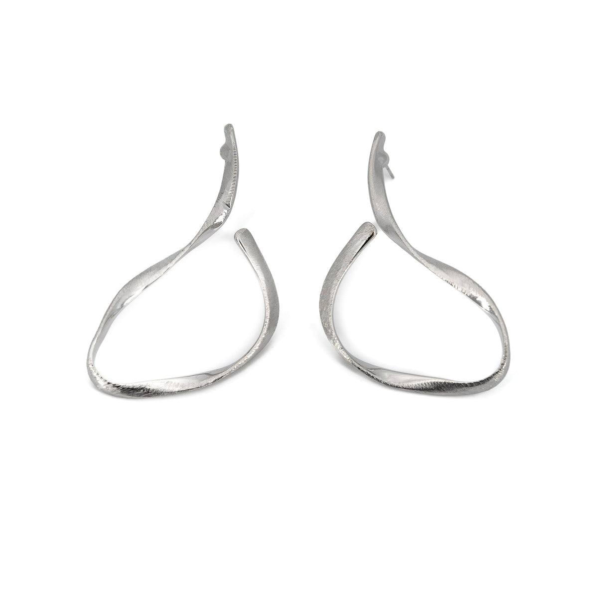 Two silver earring hooks on a white background