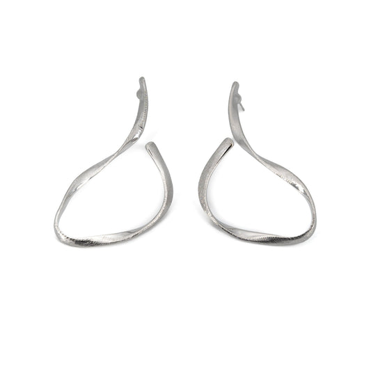 Two silver earring hooks on a white background
