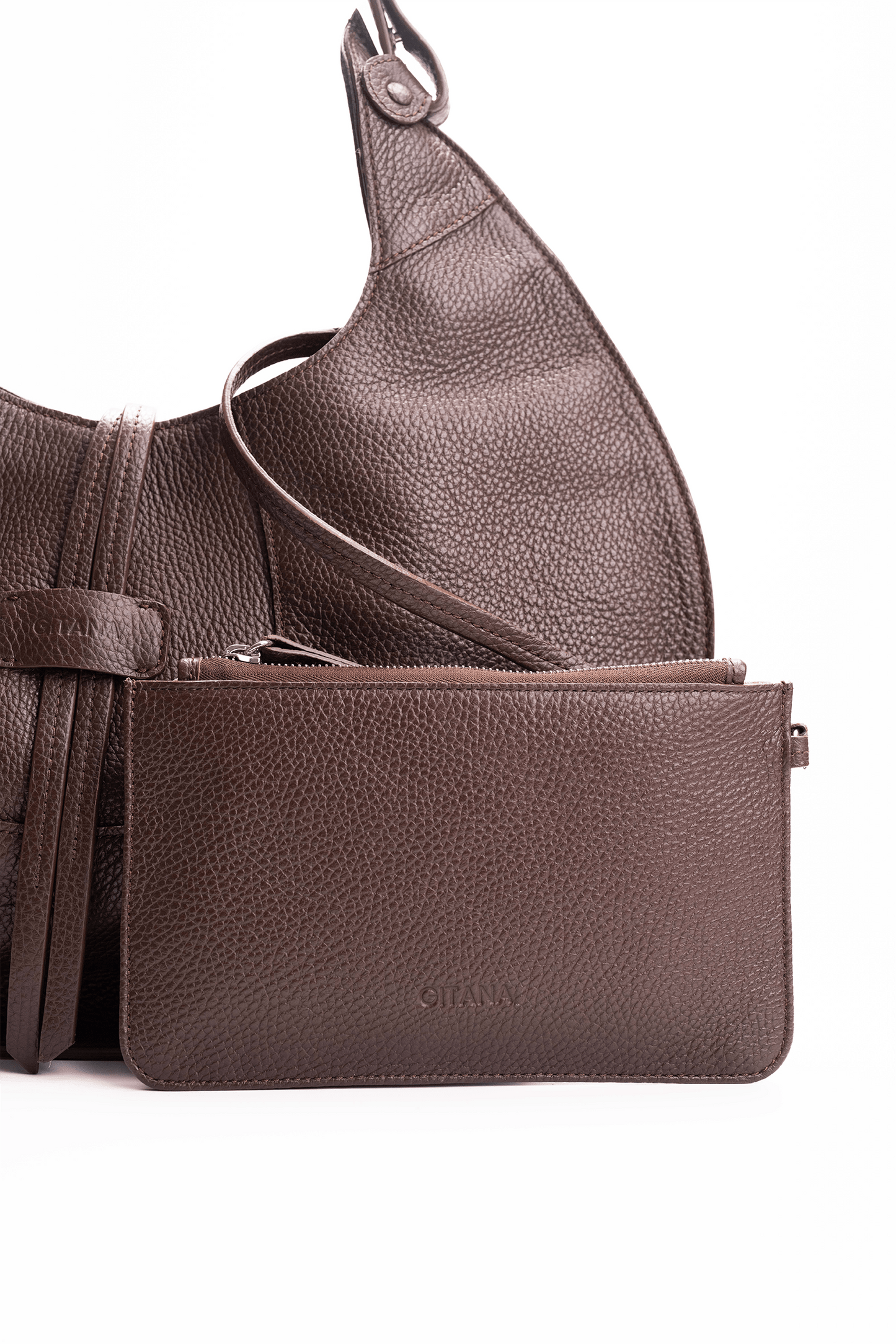 Front view of a brown luxury pebble calf tote bag with a matching small pouch attached by a strap, displayed on a white background.