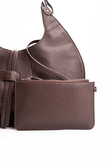 Front view of a brown luxury pebble calf tote bag with a matching small pouch attached by a strap, displayed on a white background.