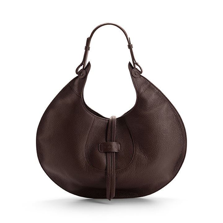 A brown designer luxury pebble calf tote bag, showcasing the curved designer silhouette against a white background.