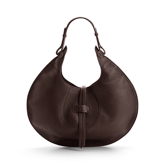 A brown designer luxury pebble calf tote bag, showcasing the curved designer silhouette against a white background.