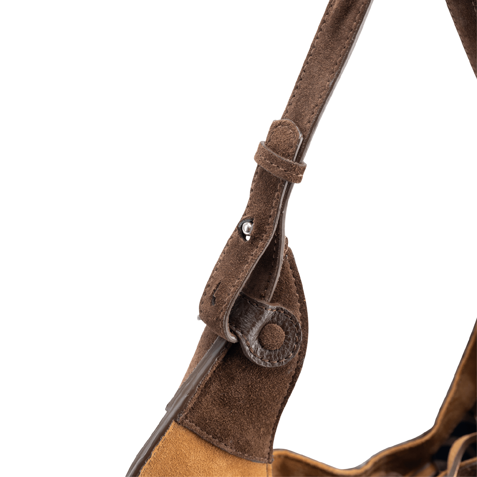Close-up of a shoulder strap on a designer luxury chocolate brown suede tote bag.