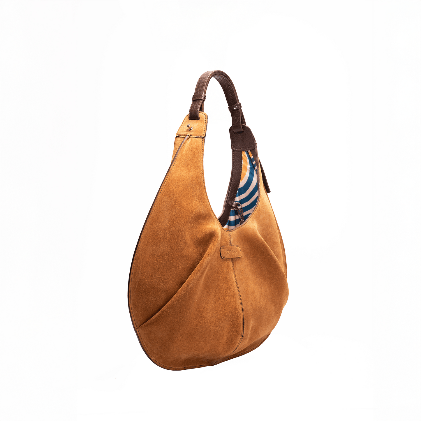Side view of a large caramel luxury suede tote handbag on a white background.