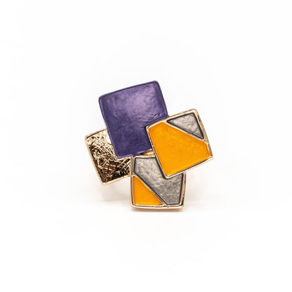 Mosaic Ring by KLK: rose gold elastic ring topped with four overlapping enamelled squares in violet, mustard and brushed grey