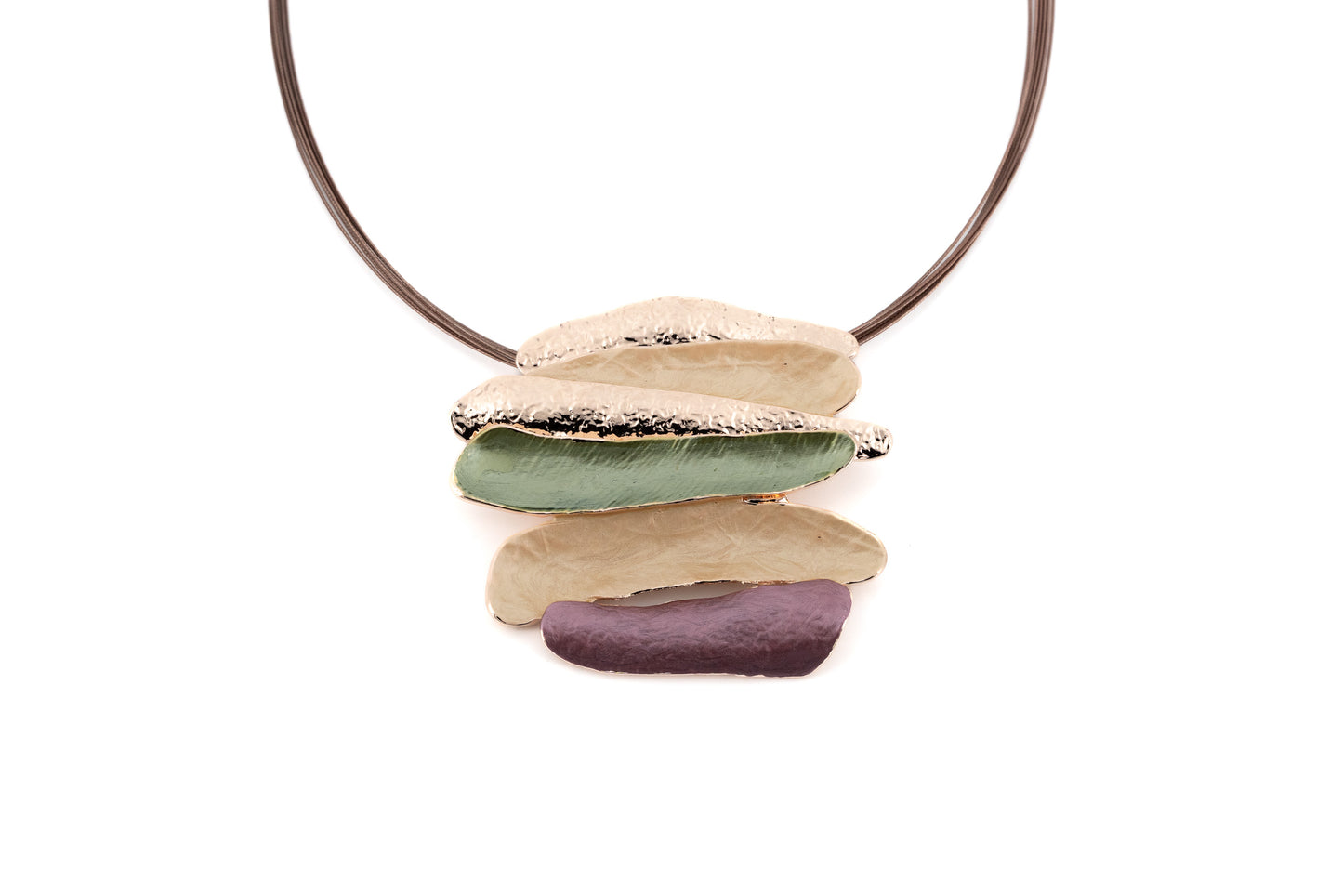 Statement necklace with layered organic bar pendant in cream, sage green and mauve with gold metallic edges, suspended from brown steel multi-cable on white background