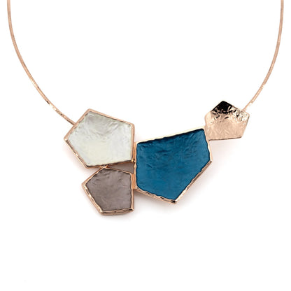 Beehive Necklace: rose gold twisted cable choker with a honeycomb cluster of hand-painted ivory, taupe and petrol blue facets and a hammered rose gold piece