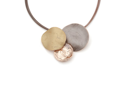Short Zamak necklace with three overlapping round pendants in rose gold, taupe and champagne enamel on brown steel cords