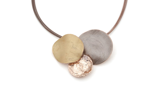 Short Zamak necklace with three overlapping round pendants in rose gold, taupe and champagne enamel on brown steel cords