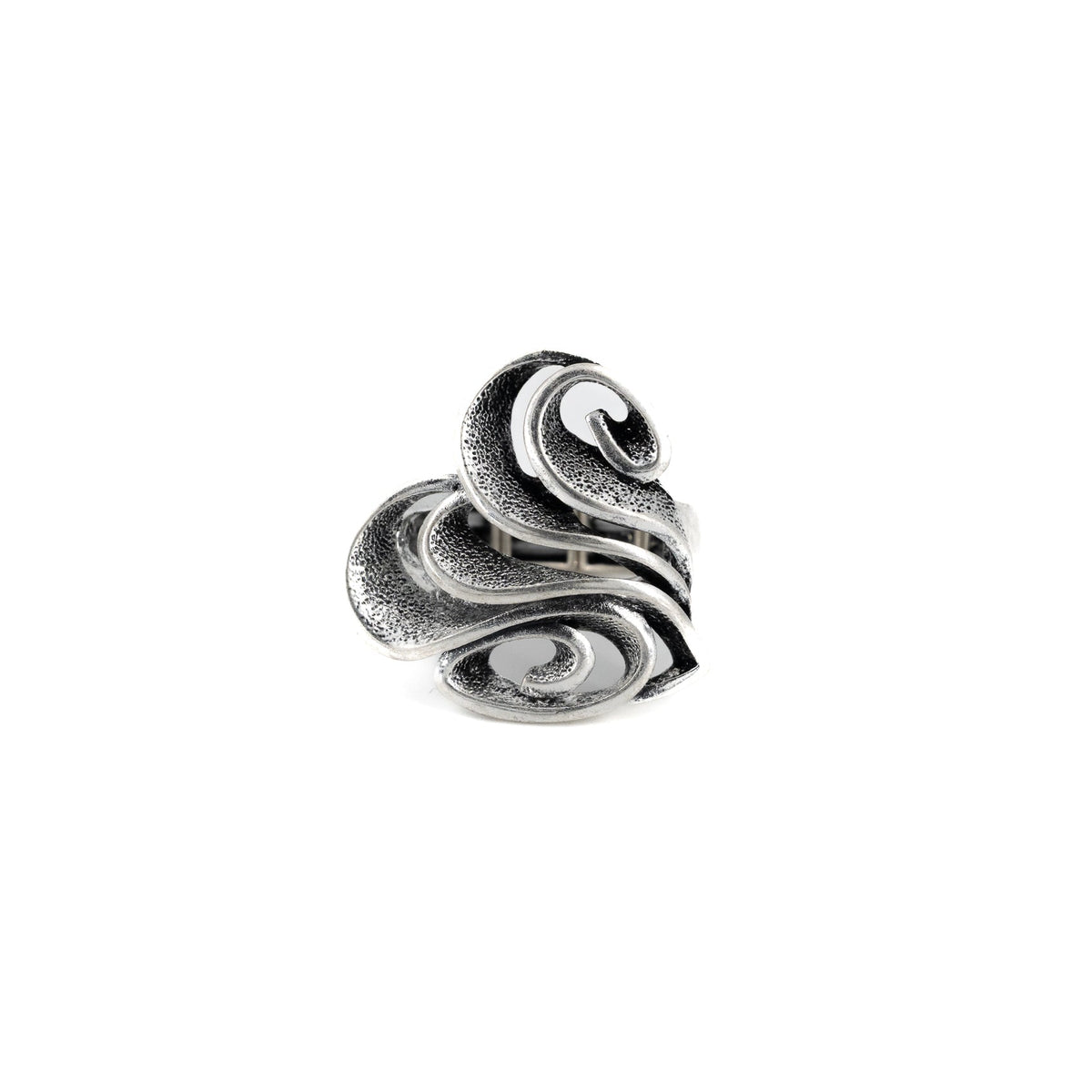 A silver-toned ring with a sculpted, layered design resembling overlapping stylized leaves or petals, shown on a plain white background.