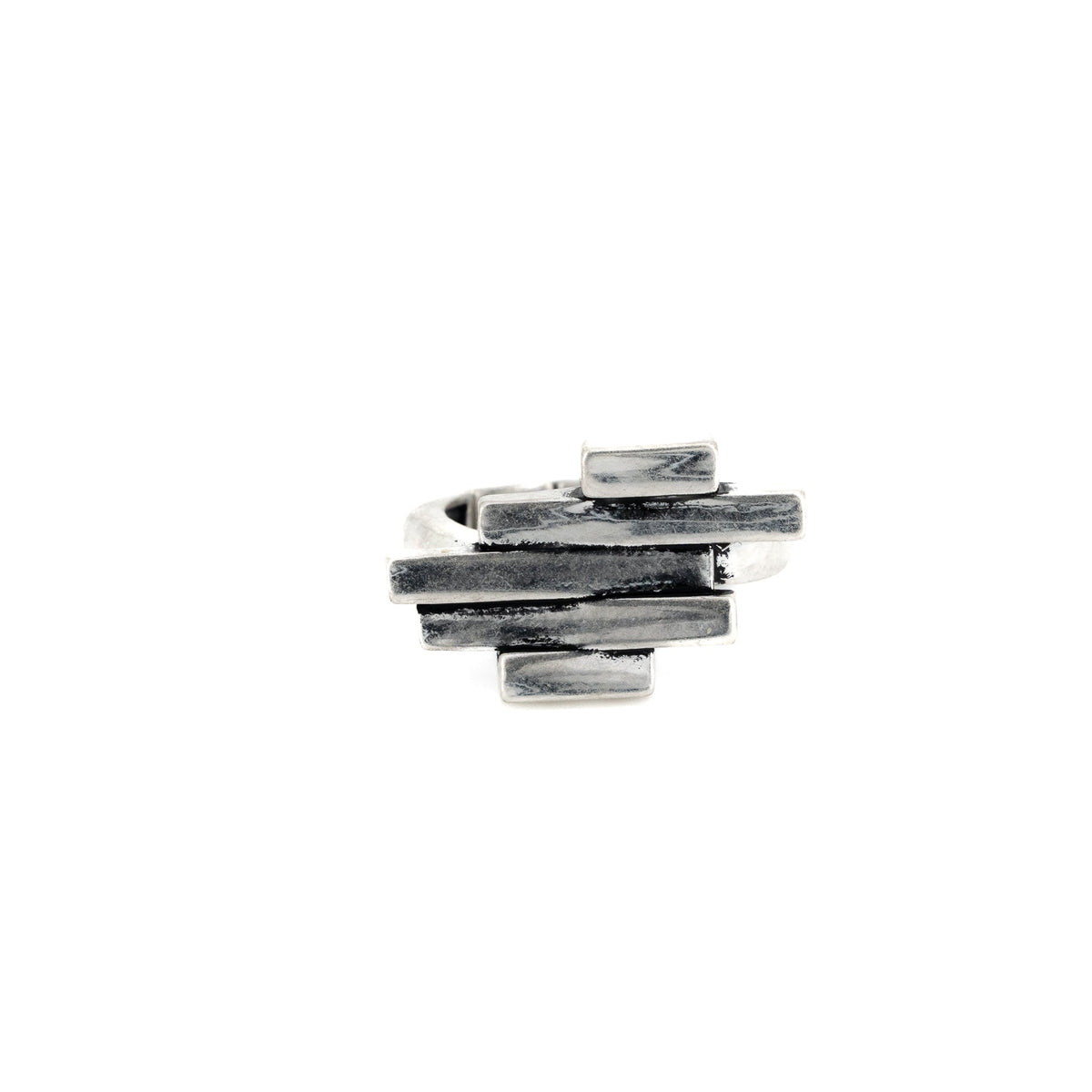 A silver ring with stacked elongated bricks on a white background.