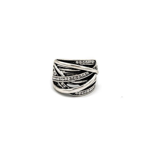 A silver wrap-style ring with twisted bands and small pavé-set clear stones, centered on a plain white background.