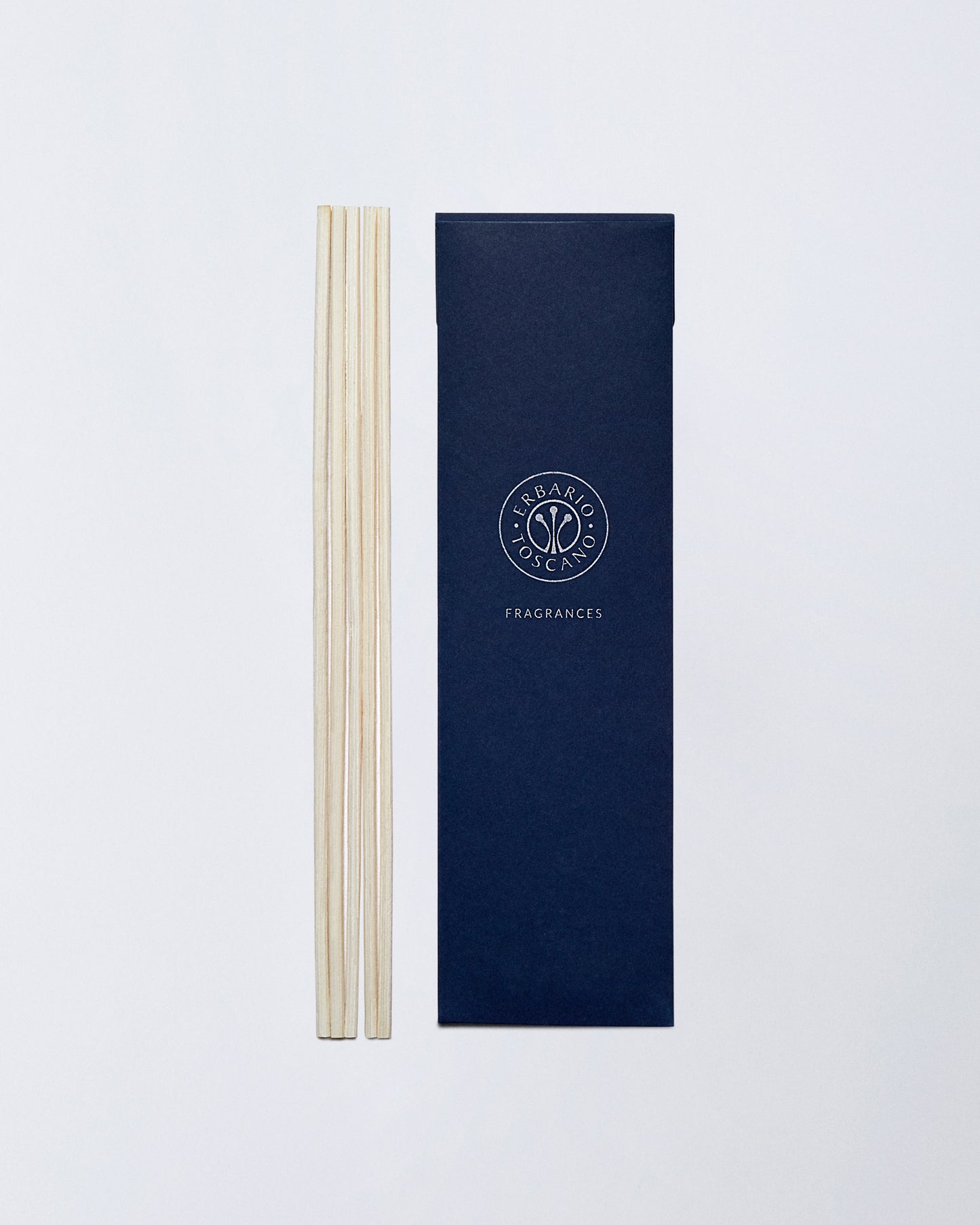 Wooden diffuser replacement sticks with navy blue Erbario Toscano Fragrances packaging box by Gitana Lifestyle