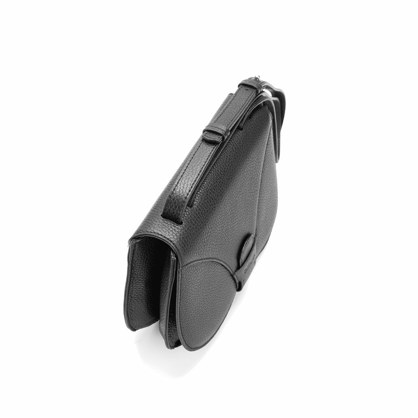 The black Italian pebbled calf leather crossbody handbag seen from above, focusing on the adjustable handle.