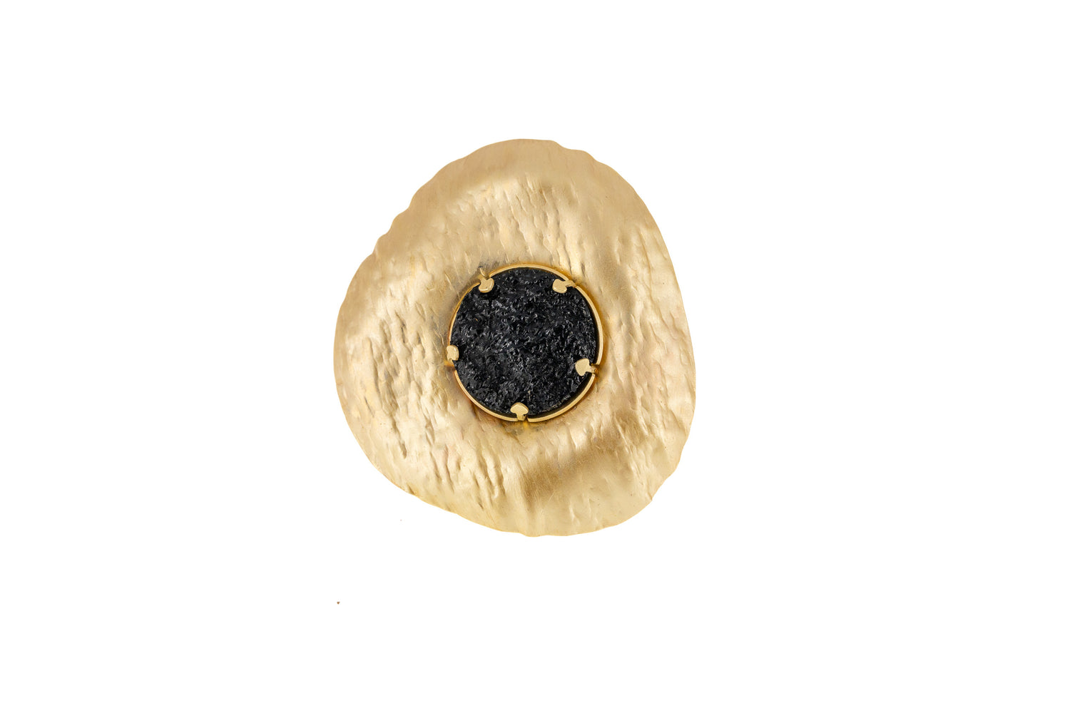Sun Resin Ring in matt gold with a round black resin centre set in a sculptural organic-shaped brass disc, top-down product shot on white background