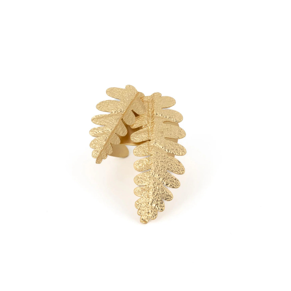 Gold leaf-shaped ring on a white background