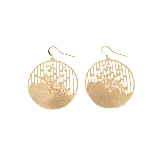 A pair of gold-toned circular drop earrings with a textured lower half and an openwork upper half, shown on a plain white background.