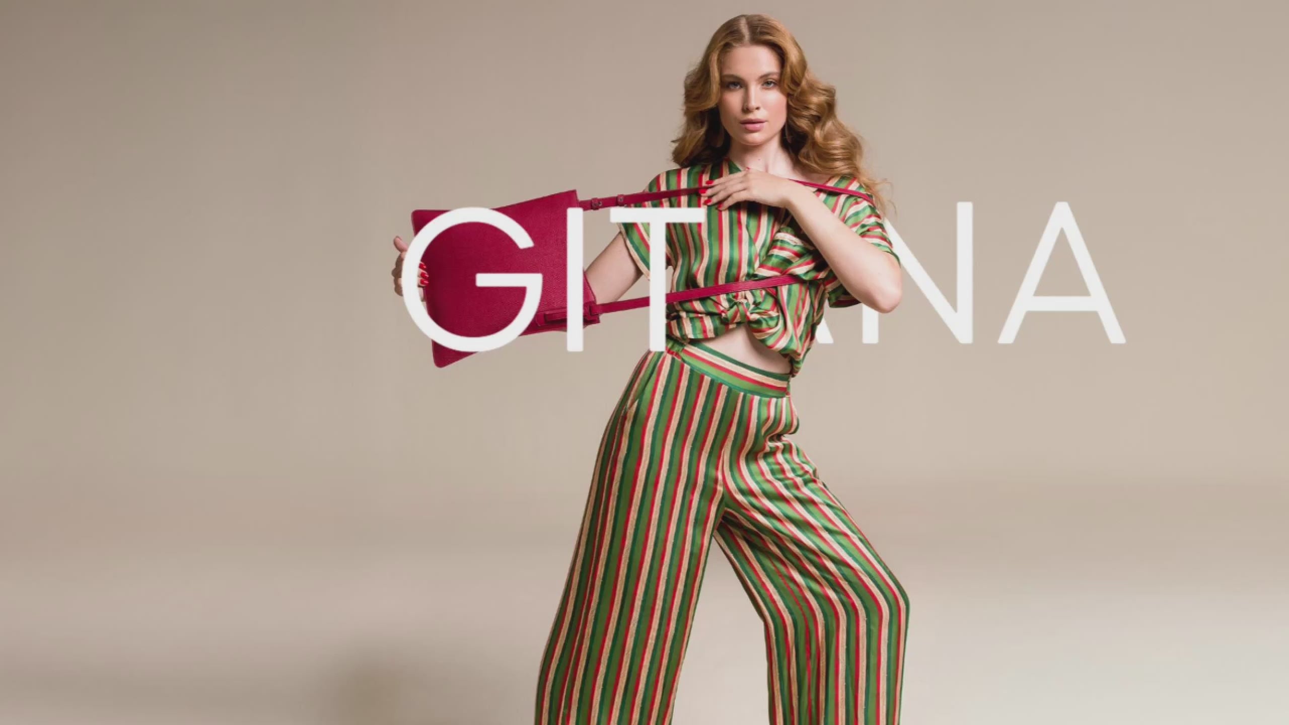 Load video: The video includes a model photo shoot for Gitana Lifestyle's new handbag collection